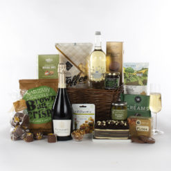 a gift basket with champagne, sparkling drink and a mix of snacks and treats