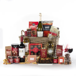 a grand gift basket with wines and snacks