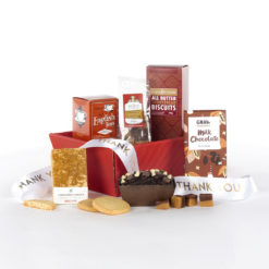 a red gift box wtih snacks and treats