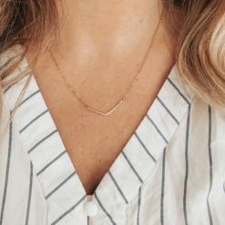 gold necklace with chevron pendant