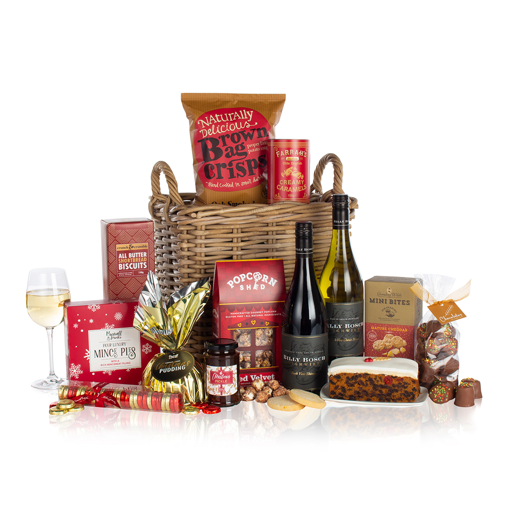 red and white wines, a mix of snacks and treats in a wicker basket