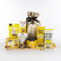 gluten free snacks in a gold gift bag
